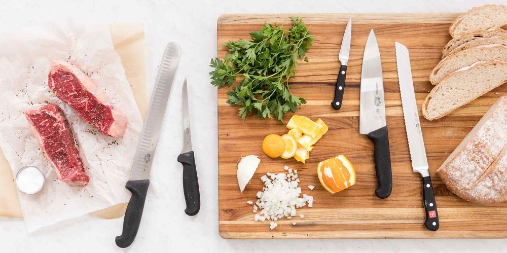 Kitchen knives on cutting board